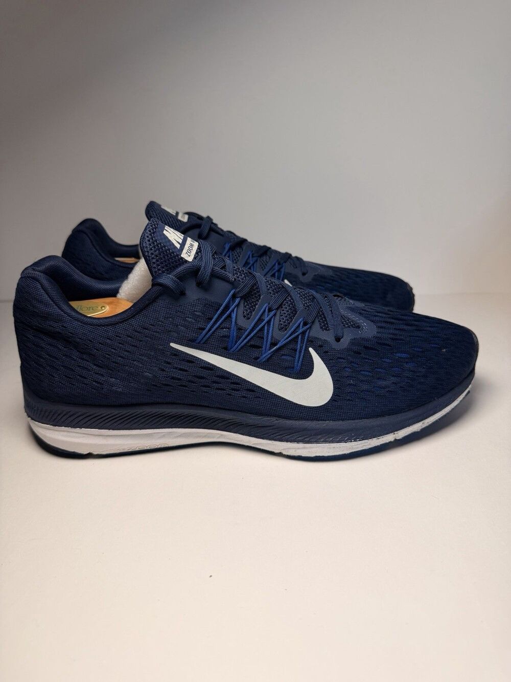 These shoes are the Nike Air Zoom Winflo 5 running shoes.